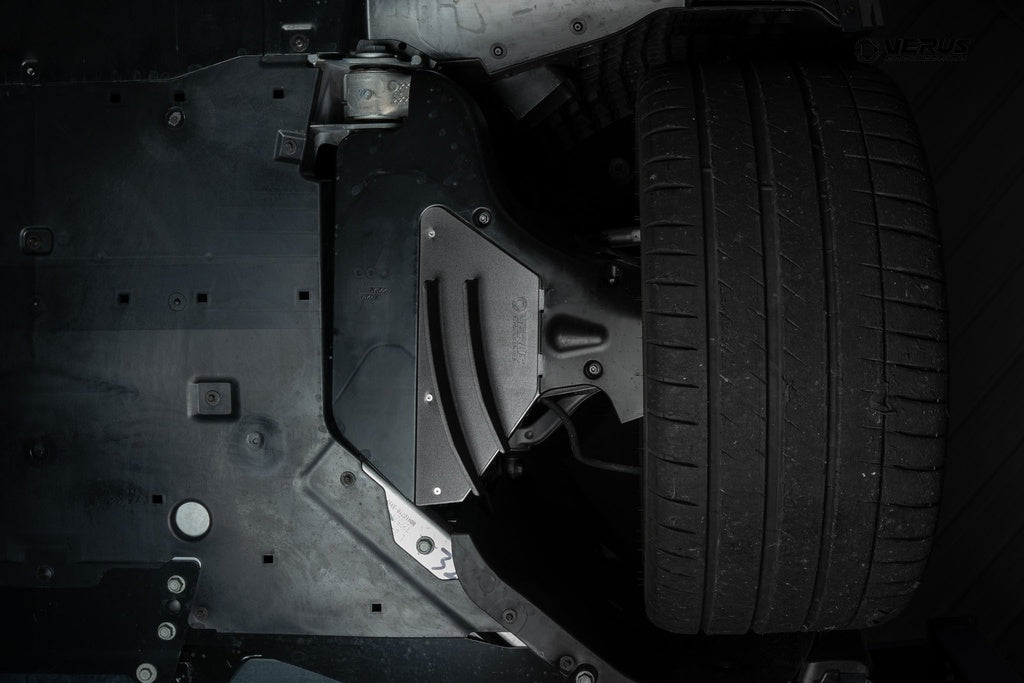Control arm guide strakes fitted to C8 Corvette control arms